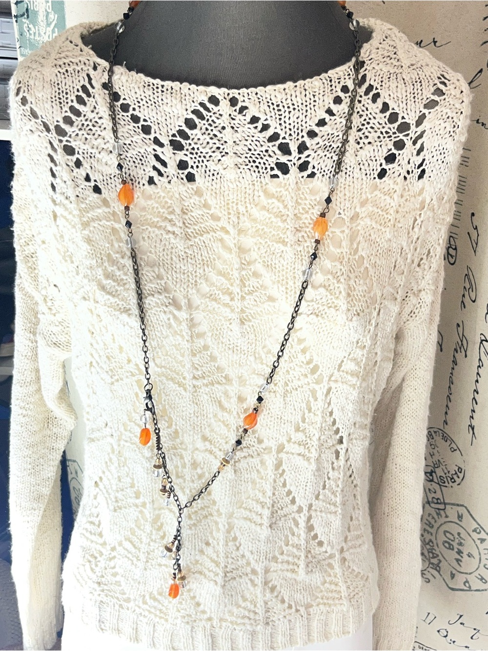 long boho-style necklace Yshaped drop translucent orange, glass, &black beads
